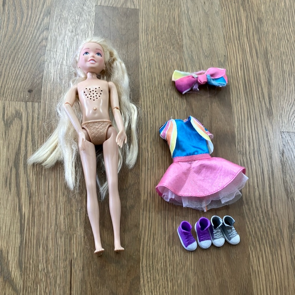 Jojo Siwa Singing Doll And Rainbow Doll Clothing